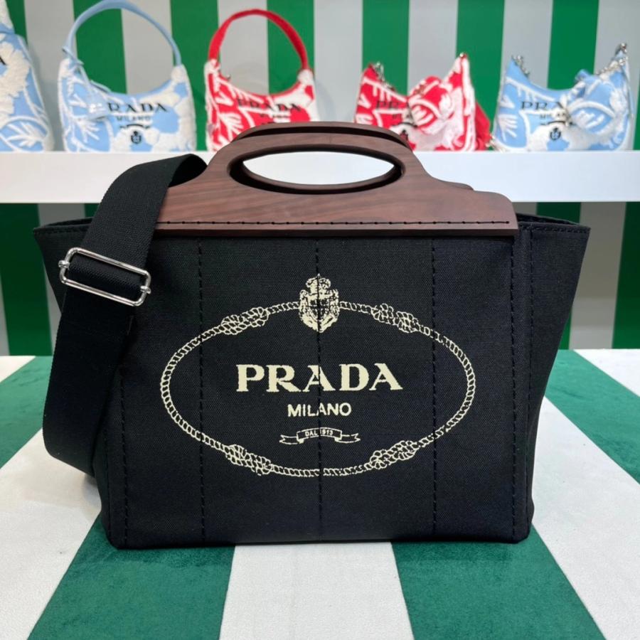 프라다 카나파 우드 핸들 토트백 1BG350
